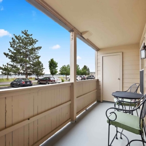 private patio with door closed to storage area on model home